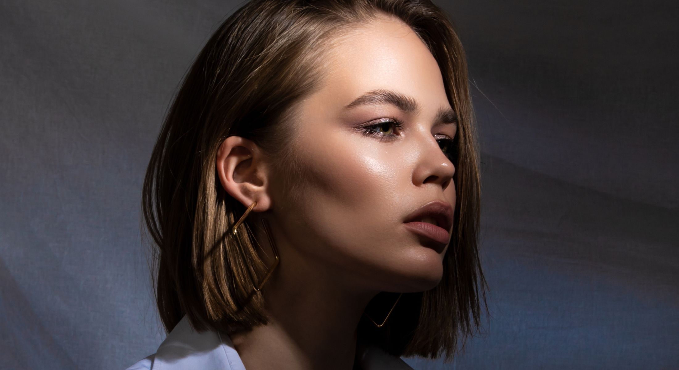 Profile of a woman with a stylish haircut.